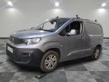 the silver van is parked on a checkered floor in a room