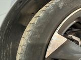 a close up of a tire on a vehicle