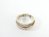 a close up of a ring on a white surface