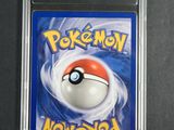 a close up of a pokemon new world card on a table