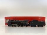 the train is black and red with a red box on the side