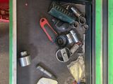 many tools that are sitting in a metal box
