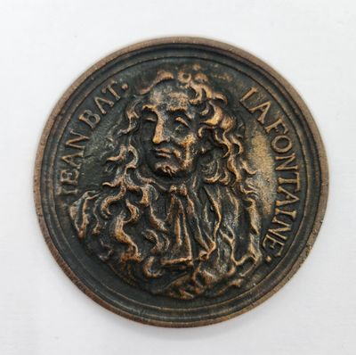l'image d'une pièce de monnaie sur laquelle figure le visage d'un homme