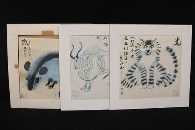 three chinese ink paintings of animals and birds on a black background