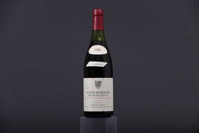 a bottle of wine sitting on top of a table