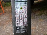 a parking meter that has a sticker on it