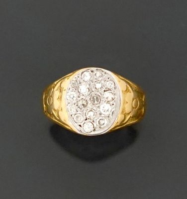 Fine chevalière en or jaune et gris 18K 750 millièmes, le pl…