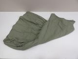 a blanket that is laying on a white table