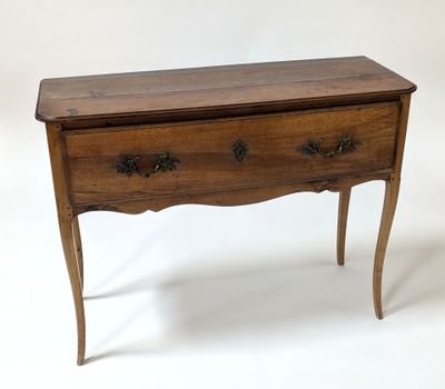 an image of a small wooden table with two drawers on it