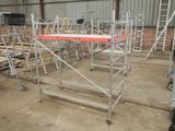 a lot of scaffolding in a building that is being built