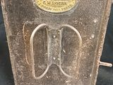 an old toaster that is sitting on a black cloth