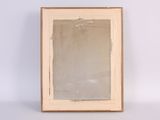 an old picture frame sitting on top of a table next to a white wall