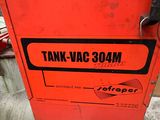 a close up of a red box with a sign on it