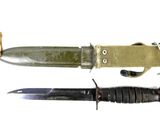 two different types of knives on display on a white surface