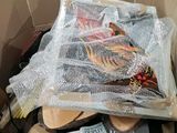 a cardboard box filled with assorted items in it