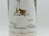 a bottle of wine that is sitting on a table