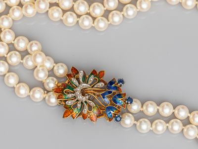two strand pearl necklace with multicolored flower broocher