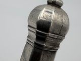 a close up of a metal object on a table