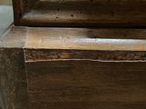 a close up of a piece of wood on a table
