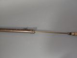 a wooden handle with a wooden handle on it