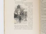 an open book with a drawing of a man sitting at a table