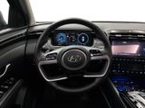 the interior of a car with a steering wheel and dashboard controls