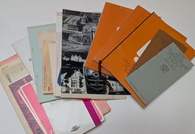 many different types of papers on a table