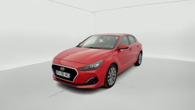 a red car in a white room with a white floor
