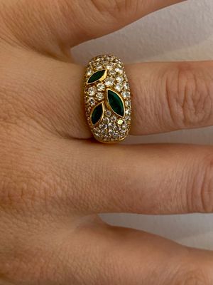 Bague en or jaune 750 millièmes sertie d'émeraudes dans un p…