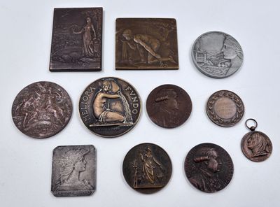 several different types of coins are displayed on a white surface