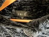 a close up of a coat with a label on it