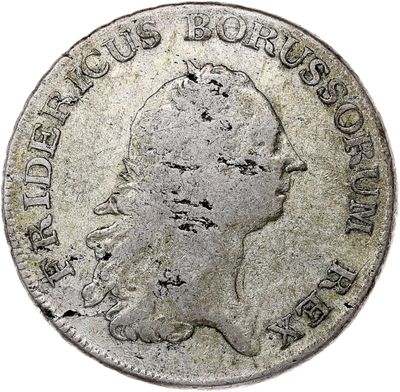 a close up of a coin on a white background