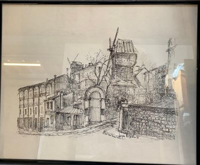 une photo d'un dessin représentant un bâtiment, dans un cadre