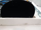 a black purse sitting on top of a white box on top of a table