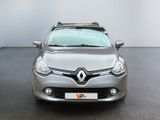 the front view of a silver car parked in a room