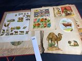 an open book with pictures of animals and animals on it