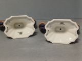 pair of antique porcelain candlesticks with blue and white decoration