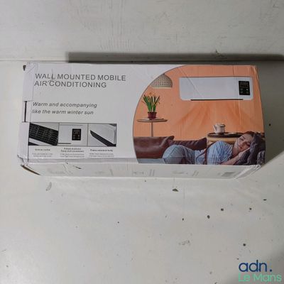 a box with a picture of a man sitting on a couch
