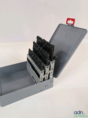 a box with a bunch of drill bits inside of it