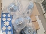 a box full of blue and white items on a table
