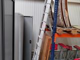 a ladder that is sitting on a shelf in a room