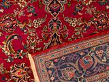 an image of a red carpet with a blue and red design on it