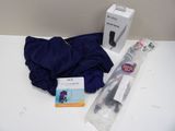 a toothbrush and a toothpaste in a package on a table