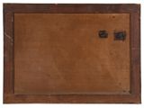 an old wooden picture frame with a picture of a dog on it