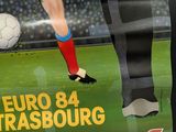 a poster of a soccer player kicking a soccer ball