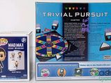 a box with a game on it next to a box with a card game on it