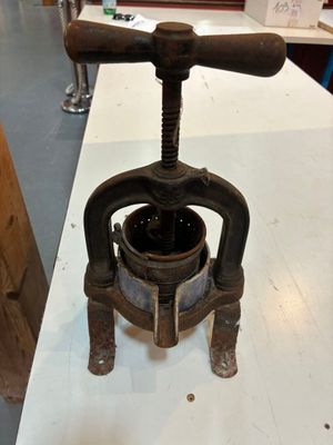 a small metal object on a table in a room