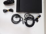 a video game console and a game controller on a table