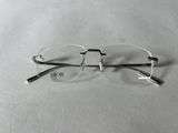 glasses on a table with the word dior written on it