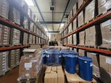 a large warehouse filled with lots of boxes and pallets